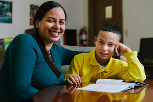 A photo of the Valdez family, MassHousing renters
